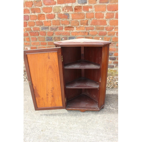 477 - A mahogany corner hanging cupboard enclosed panel door, 20