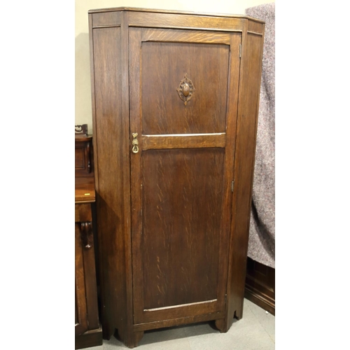 501 - An oak hall wardrobe enclosed panel door, 36