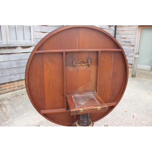 406 - A Regency/William IV rosewood and banded brass inlaid circular top table, on turned column and tripo... 