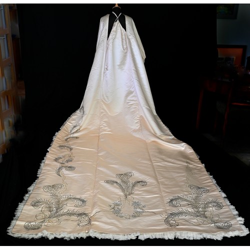 169 - A mid century Duchesse silk satin and interlined court train, beaded as sequined with a feather desi... 