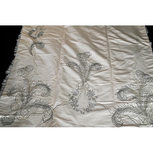 169 - A mid century Duchesse silk satin and interlined court train, beaded as sequined with a feather desi... 