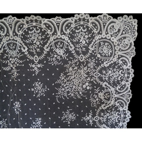 170 - A late 19th century Brussels needle lace applique bridal veil with floral design, 74