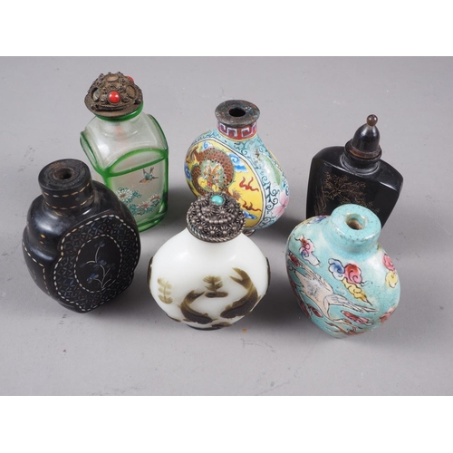 100 - A Chinese snuff bottle with enamelled dragon and verse decoration, four-character mark to base (lack... 