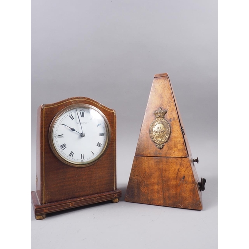 116 - A French mahogany cased mantel clock with line inlay, white enamel dial and Roman numerals, dial sig... 