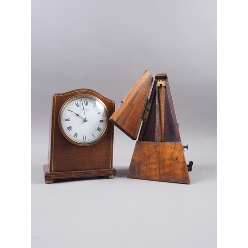 116 - A French mahogany cased mantel clock with line inlay, white enamel dial and Roman numerals, dial sig... 