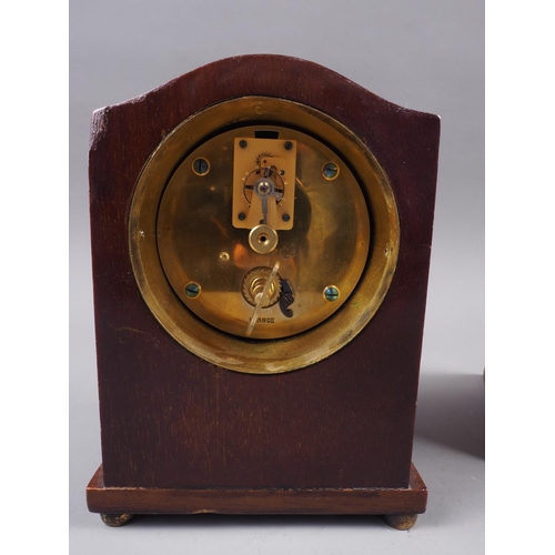 116 - A French mahogany cased mantel clock with line inlay, white enamel dial and Roman numerals, dial sig... 