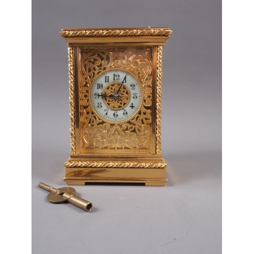 117 - An early 20th century Strydhagen style five-window and gilt metal hour striking carriage clock with ... 