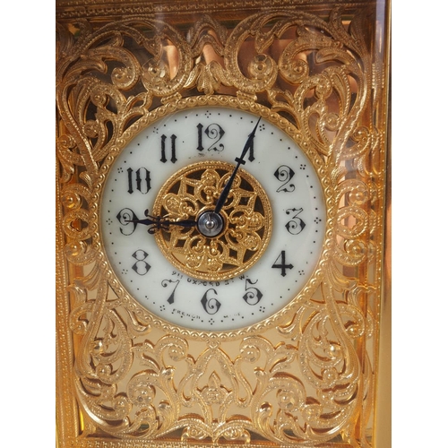 117 - An early 20th century Strydhagen style five-window and gilt metal hour striking carriage clock with ... 