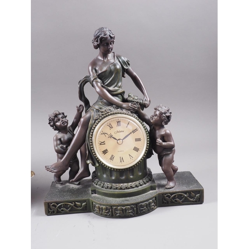 125 - An Imperial reproduction brass and marble mantel clock flanked by fauns with a cream enamel dial and... 