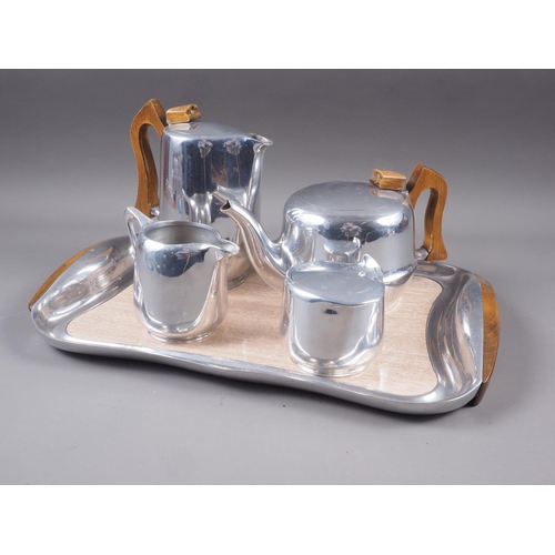 136 - A retro Picquot ware four-piece teaset and tray