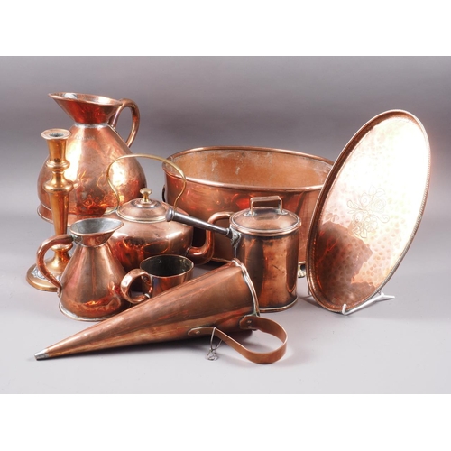 143 - A quantity of metalware, including a copper planter, two copper kettles, a pair of copper and pewter... 