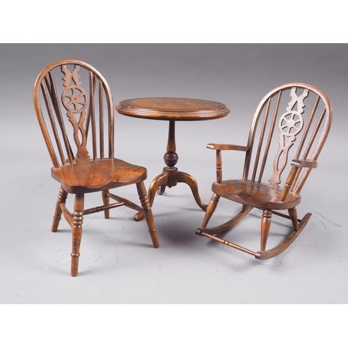 159 - A miniature elm Windsor wheel rocking chair, 5 3/4