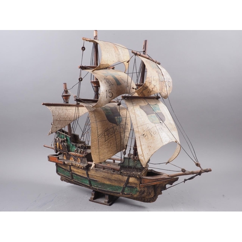 160 - A wooden model of a Portuguese 16th century galleon 19 1/2