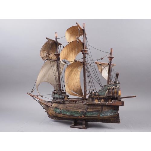 160 - A wooden model of a Portuguese 16th century galleon 19 1/2