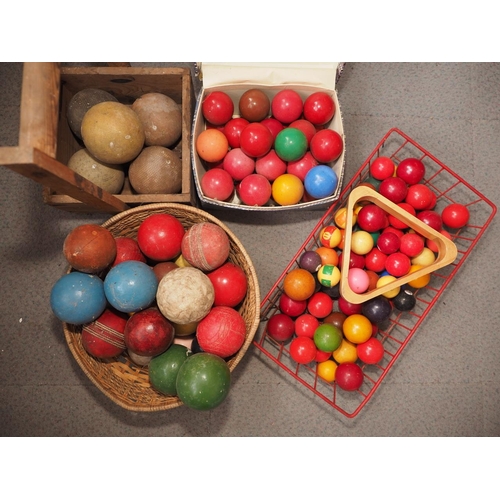 168 - A quantity of loose gaming balls, including snooker, pool, cricket, croquet, etc