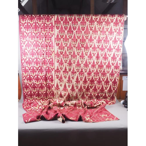 178 - A 19th century silk embroidery wall hanging with geometric designs, in shades of red and natural, 10... 