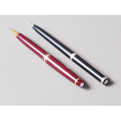 199 - A crimson cased Mont Blanc roller ball pen and a similar black cased Mont Blanc roller ball pen