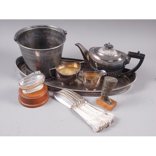 232 - A  Mappin Brothers silver plated three-piece teaset, on tray, a quantity of plated butter knives, an... 