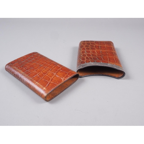 234 - A silver mounted crocodile leather cigar case