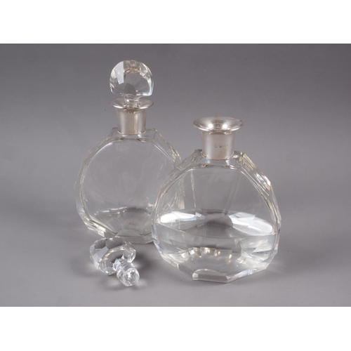 247 - A pair of Art Deco silver collared and faceted bodied decanters, 8 3/4