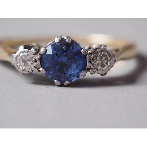 269 - An 18ct gold, sapphire and diamond three-stone dress ring, size N, 1.9g