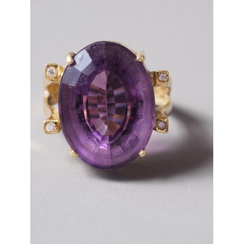 272 - An 18ct gold, amethyst and diamond dress ring, size P, 11.4g