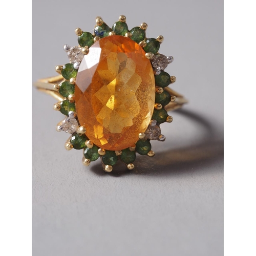 273 - An 18ct gold, citrine, peridot and diamond dress ring, size N/O, 6.2g