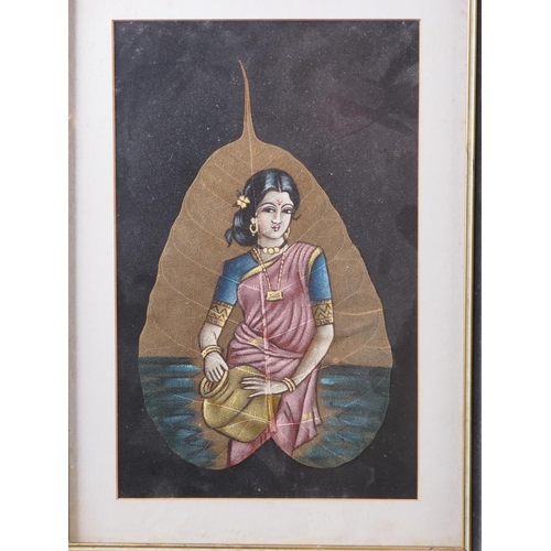 336 - An Indian watercolour leaf painting of a woman in a sari, 11