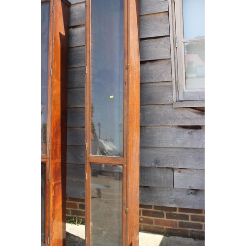 389 - A pair of 19th century glazed mahogany display cases with adjustable shelves, 14