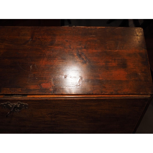 394 - A 19th century mahogany fall front bureau, fitted one long drawer over two short drawers and two fur... 