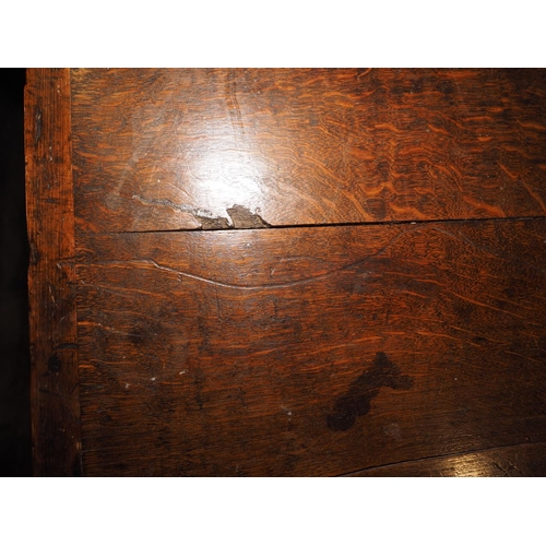 396 - An 18th century oak and walnut chest of two short and three long graduated drawers, on bracket suppo... 