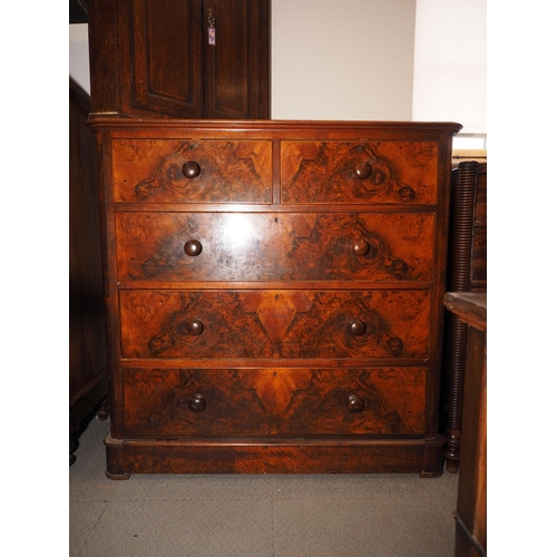 397 - A 19th century figured walnut chest of two short and three long drawers, on block base, 46