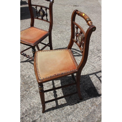 418 - A pair of 19th century grained as rosewood and brass bound bedroom chairs with brown leather seats, ... 