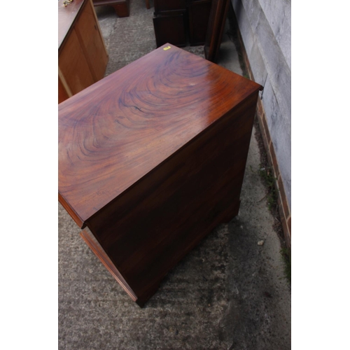 422 - A Georgian style figured mahogany chest of four long graduated drawers, on bracket supports, 24