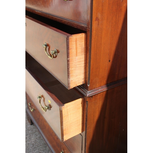 424 - A George III figured mahogany chest on chest with dentil cornice over three short and six long gradu... 