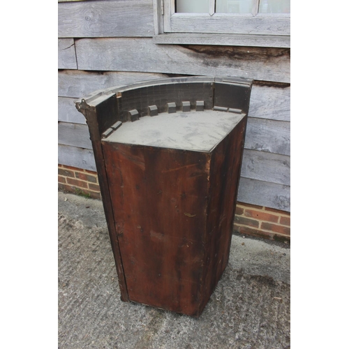 425 - A 19th century figured mahogany and inlaid bowfront hanging corner cupboard with dentil cornice and ... 