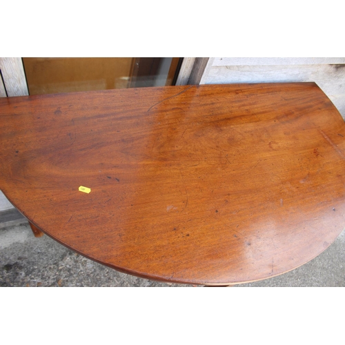 432 - A 19th century mahogany demi-lune side table, on chamfered supports, 47