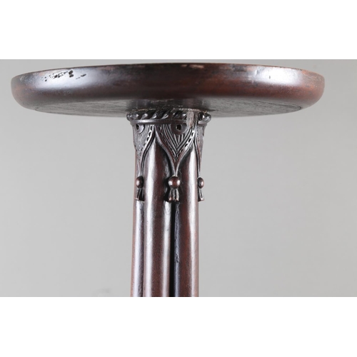 465 - A carved mahogany jardiniere stand, 32