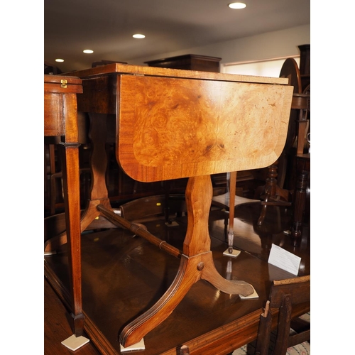 481 - A faded burr walnut and banded sofa table, on panel end splay supports, 54