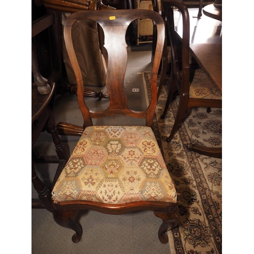 484 - A set of eight American figured walnut dining chairs with shaped splat backs and drop-in seats (6+2)