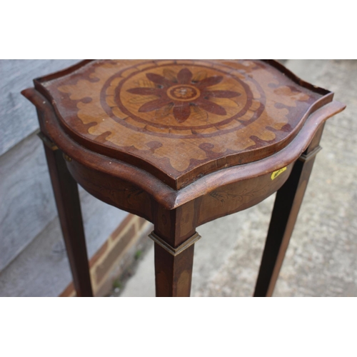 505 - An Edwardian Sheraton design mahogany and marquetry brass mounted shape top urn stand, fitted single... 