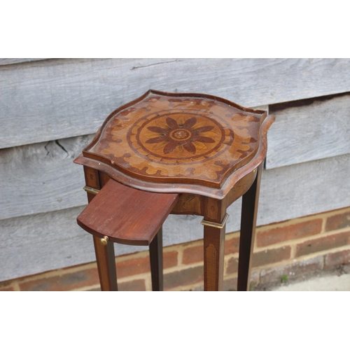 505 - An Edwardian Sheraton design mahogany and marquetry brass mounted shape top urn stand, fitted single... 