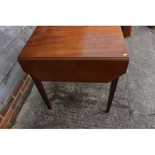 510 - A mahogany octagonal top Pembroke table, fitted one drawer, on square taper supports, 27