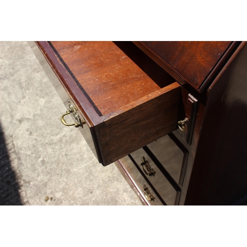 513 - A mahogany fall front bureau, fitted four long graduated drawers, 28