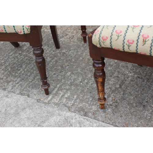 520 - A set of eight bar back dining chairs of Regency design with tapestry drop-in seats, on turned suppo... 