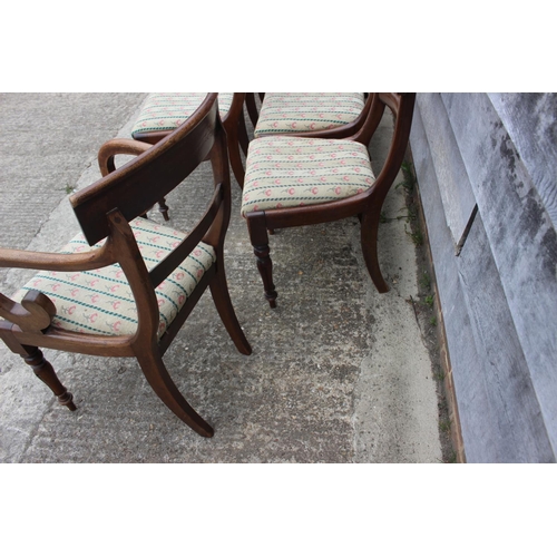 520 - A set of eight bar back dining chairs of Regency design with tapestry drop-in seats, on turned suppo... 