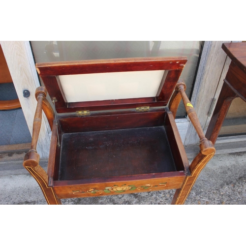 523 - An Edwardian mahogany and inlaid box seat piano stool with Art Nouveau decoration, 20