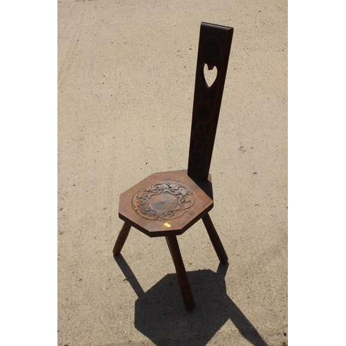 534 - A mahogany octagonal top two-tier occasional table, 26