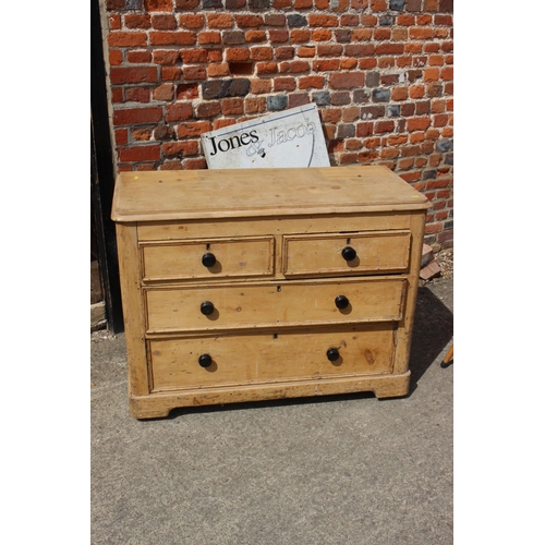 547 - A pine  chest of two short and two long drawers with knob handles, 41