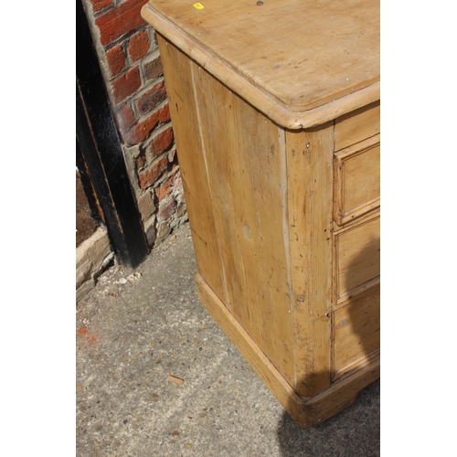 547 - A pine  chest of two short and two long drawers with knob handles, 41